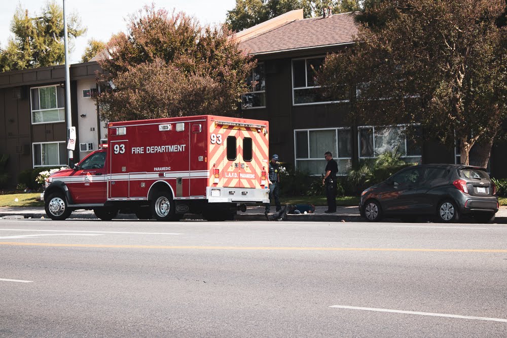 Wreck Causes Head Injury on Burnett Ave