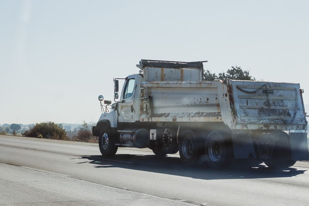 Garbage Truck Crash Leaves Worker Hurt on Fay Ave